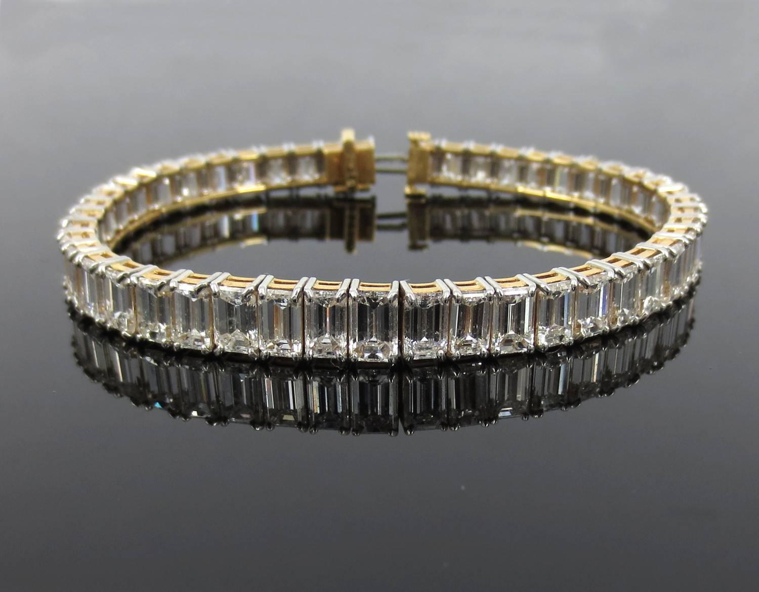 Tiffany & Co. platinum/18k emerald cut diamond straight line bracelet. Contains 47 diamonds weighing approx. 28cts total. Total weight of bracelet 25 grams.