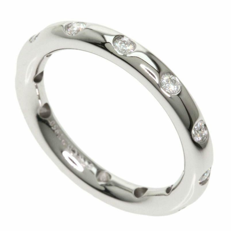 TIFFANY & Co. Platinum .18ct Diamond Bezet Band Ring 4.5

 Metal: Platinum
 Size: 4.5 
 Band Width: 2.6mm
 Weight: 5.20 grams 
 Diamond: round brilliant diamonds, carat total weight .18 
 Hallmark: ©T&CO. PT950
 Condition: New, comes with Tiffany