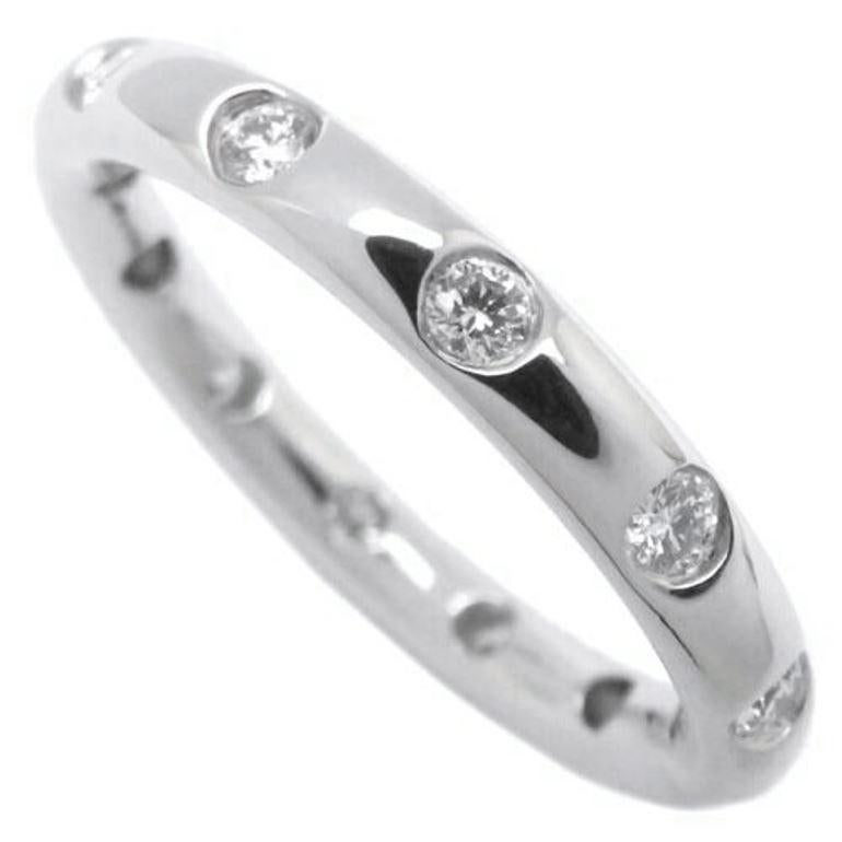 TIFFANY & Co. Platinum .18ct Diamond Bezet Band Ring 6.5

 Metal: Platinum
 Size: 6.5 
 Band Width: 2.6mm
 Weight: 5.70 grams 
 Diamond: round brilliant diamonds, carat total weight .18 
 Hallmark: ©T&CO. PT950
 Condition: Excellent condition, like