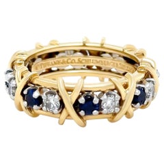 Anillo Tiffany & Co de platino y diamantes y zafiros de dieciséis piedras de 18 ct 1,34 ct