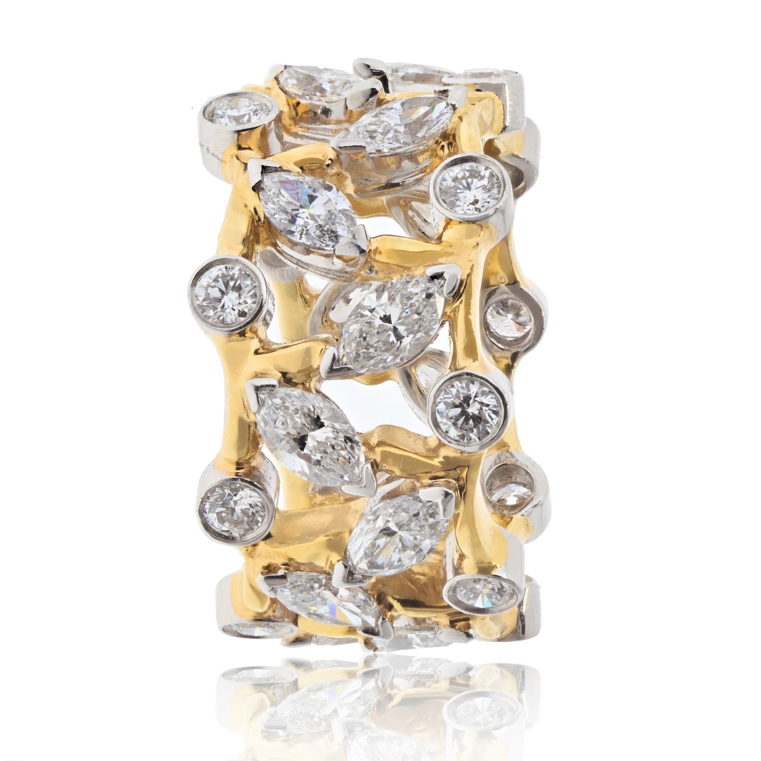 Unbelievable savings on this original Vigne Jean Schlumberger's ring. His visionary creations are celebrated as some of the world's most intricate designs. This stunning ring features blazing diamonds that illuminate its organic shape, showcasing