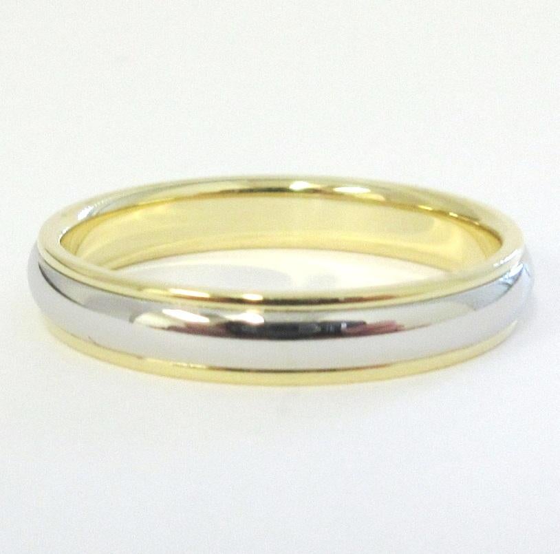 TIFFANY & Co. Classic Platinum 18K Yellow Gold 4mm Lucida Wedding Band Ring 10.5 

Metal: Platinum and 18K Yellow Gold
Size: 10.5 
Band Width: 4mm
Weight: 6.30 grams
Hallmark: ©TIFFANY&CO. 750 PT950
Condition: Excellent condition, like