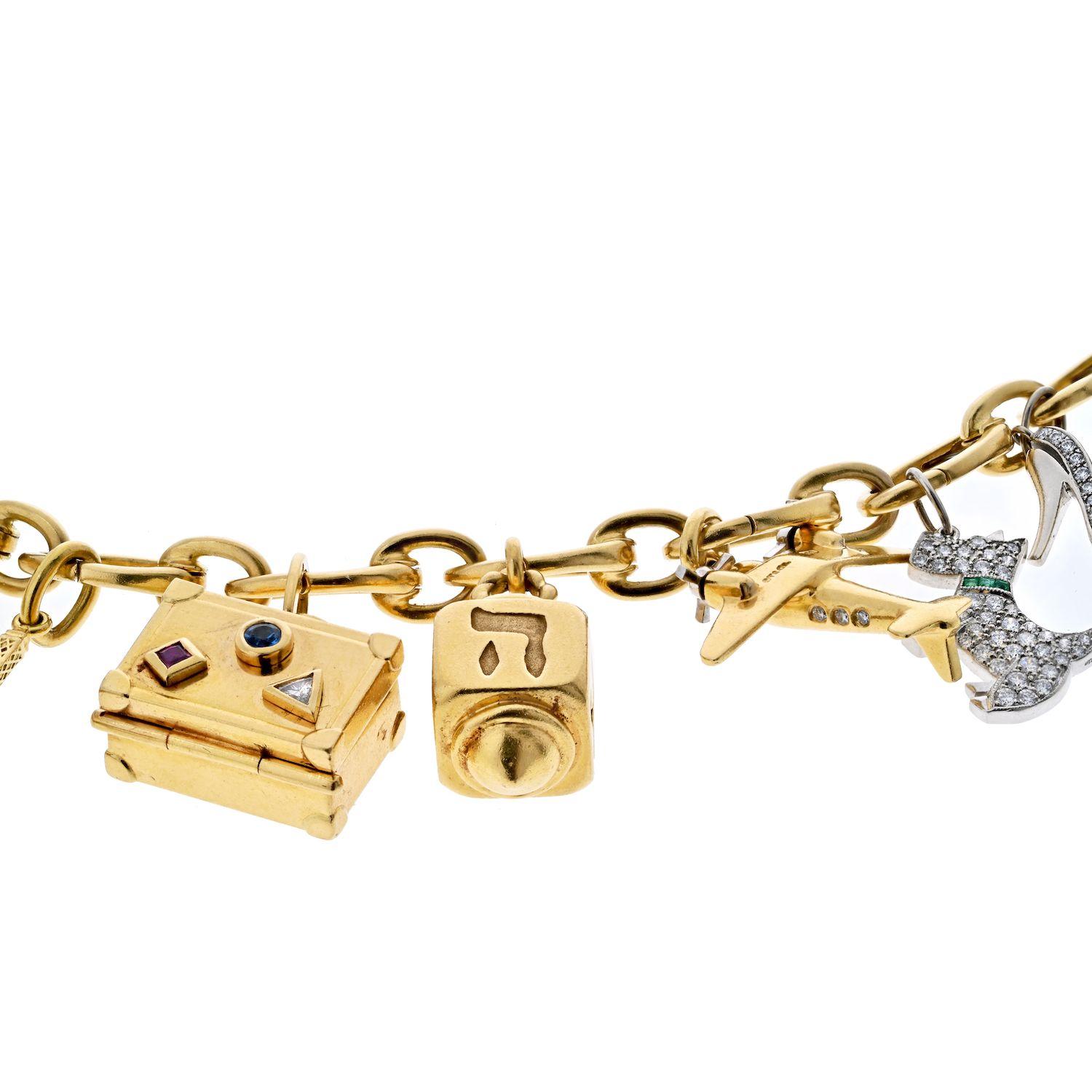 Modern Tiffany & Co. Platinum & 18K Yellow Gold Gemset And Diamond Charm Bracelet For Sale