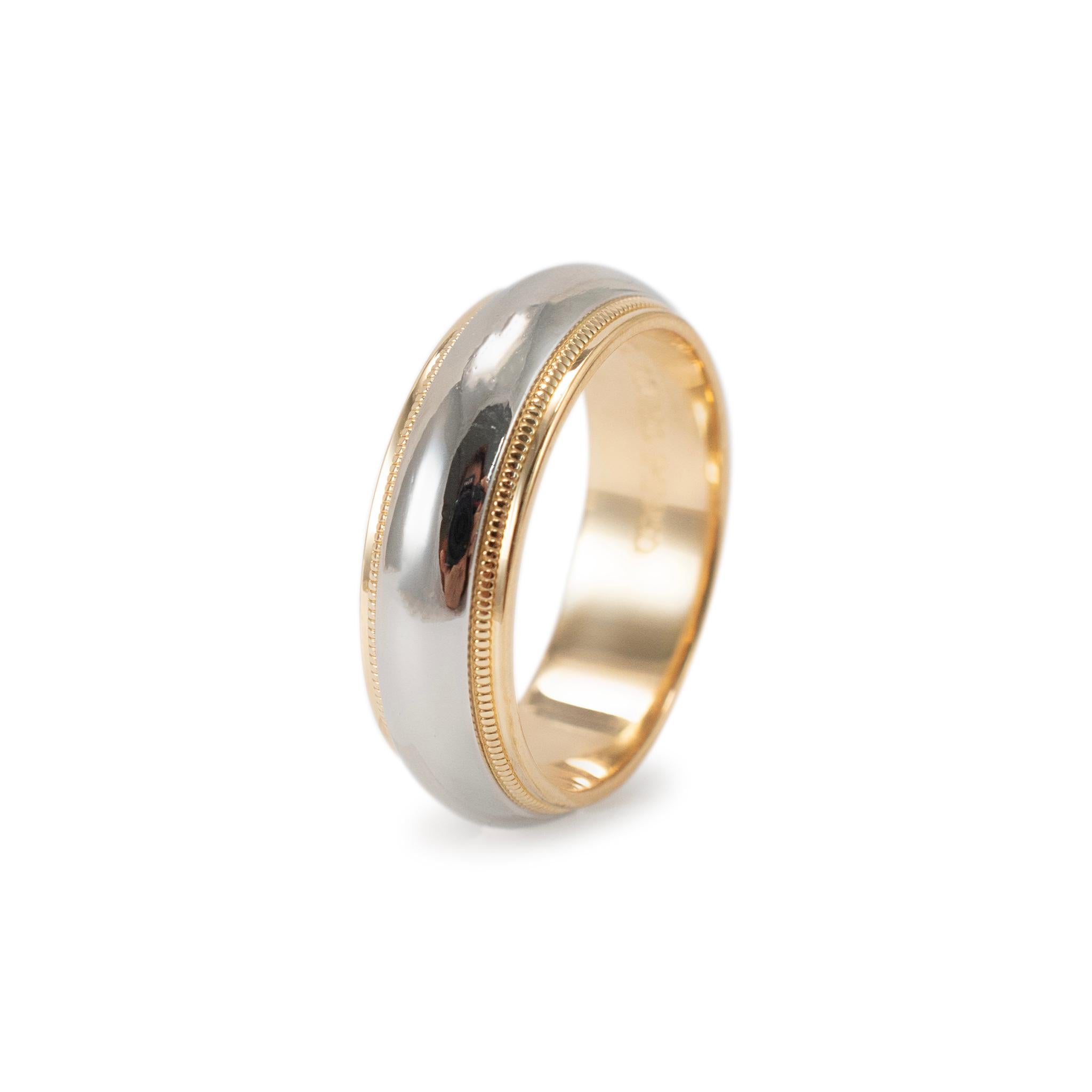Brand: Tiffany & Co.

Metal Type: 950 Platinum &18K Yellow Gold

Ring Size: 6

Width: 6.00 mm

Weight: 9.05 grams

950 platinum and 18K yellow gold wedding band with a comfort-fit shank. The metals were tested and determined to be 950 platinum and