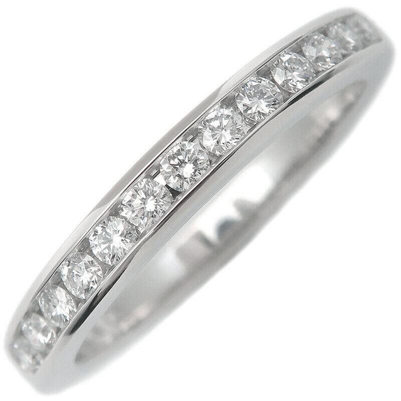 TIFFANY & Co. Alianza de Platino 2,5 mm Medio Círculo Diamante 4

Metal: Platino
Tamaño: 4
Ancho de banda: 2.5 mm
Diamante: 13 diamantes brillantes redondos, peso total en quilates 0,21
Sello: ©TIFFANY&CO. PT950
Estado: Nuevo, nunca usado, viene con