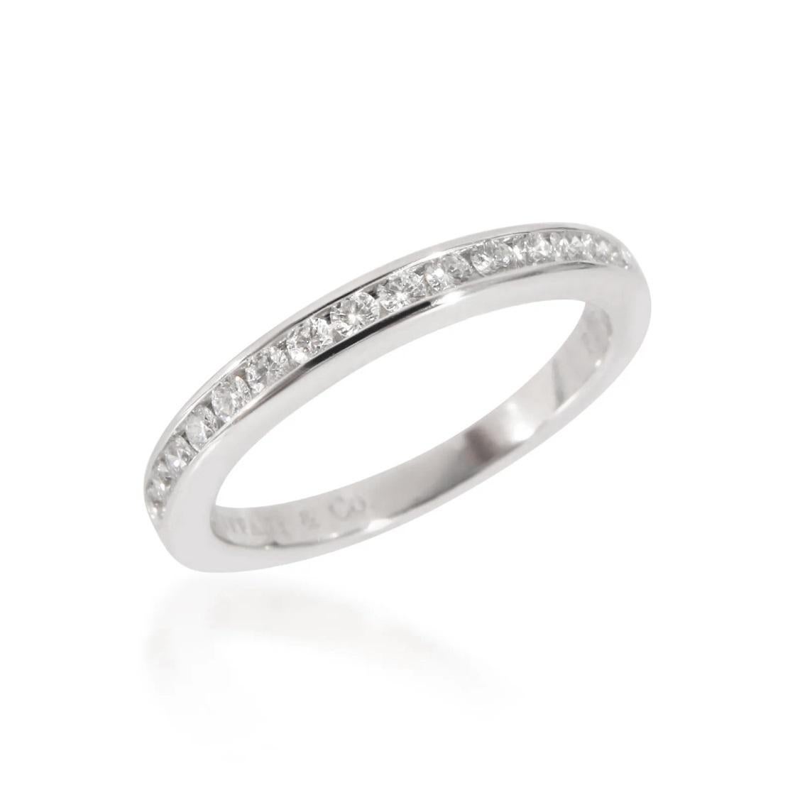 TIFFANY & Co. Platinum 2.5mm Half Circle Diamond Wedding Band Ring 5

Metal: Platinum
Size: 5
Band Width: 2.5mm 
Diamond: 15 round brilliant diamonds, carat total weight .24
Hallmark: ©TIFFANY&CO. PT950
Condition: Excellent condition
Value: