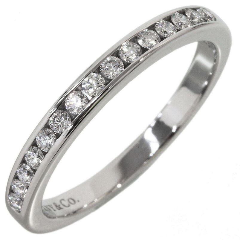 TIFFANY & Co. Platinum 2.5mm Half Circle Diamond Wedding Band Ring 5.5

Metal: Platinum
Size: 5.5
Band Width: 2.5mm 
Diamond: 15 round brilliant diamonds, carat total weight .24
Hallmark: ©TIFFANY&CO. PT950
Condition: Excellent condition, like new,
