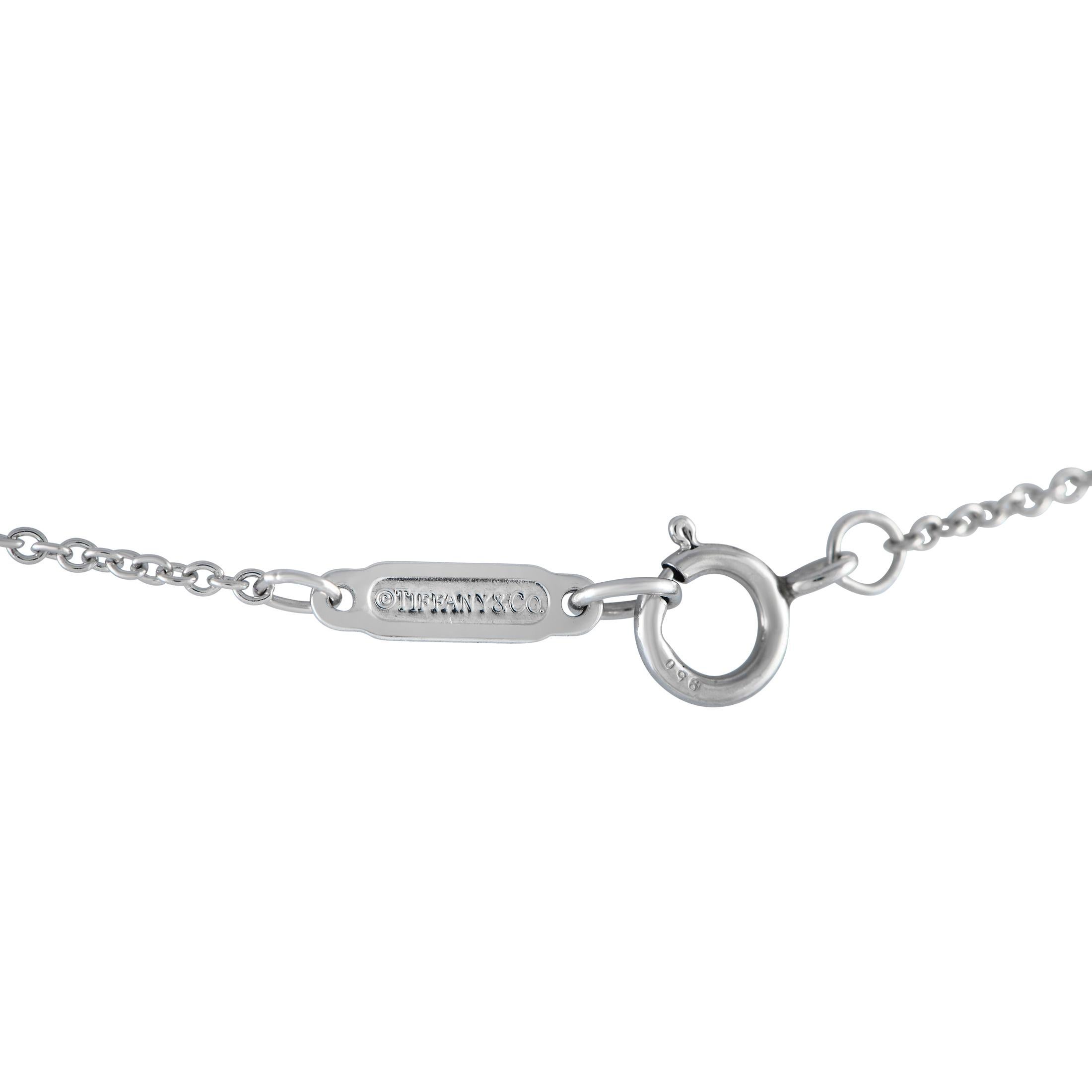 This impeccably crafted Tiffany & Co. necklace is simply exquisite in design. Suspended from a delicate 16\u201d chain is a Platinum pendant measuring 1.75\u201d long and 0.5\u201d wide. Sparkling diamonds with a total weight of 2.75 carats makes it
