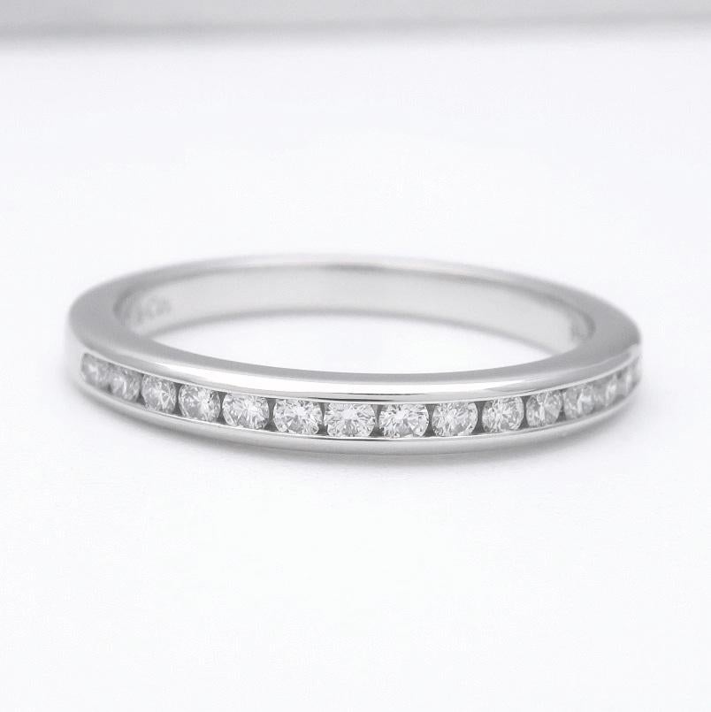 TIFFANY & Co. Platinum 2mm Half Circle Diamond Wedding Band Ring 4.5

Metal: Platinum
Size: 4.5
Band Width: 2mm
Diamond: 15 round brilliant diamonds, carat total weight .15
Hallmark: ©TIFFANY&Co. Pt950
Condition: Excellent condition, like new, comes
