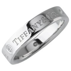 TIFFANY & Co. Anello di platino con 3 diamanti da 4 mm 7