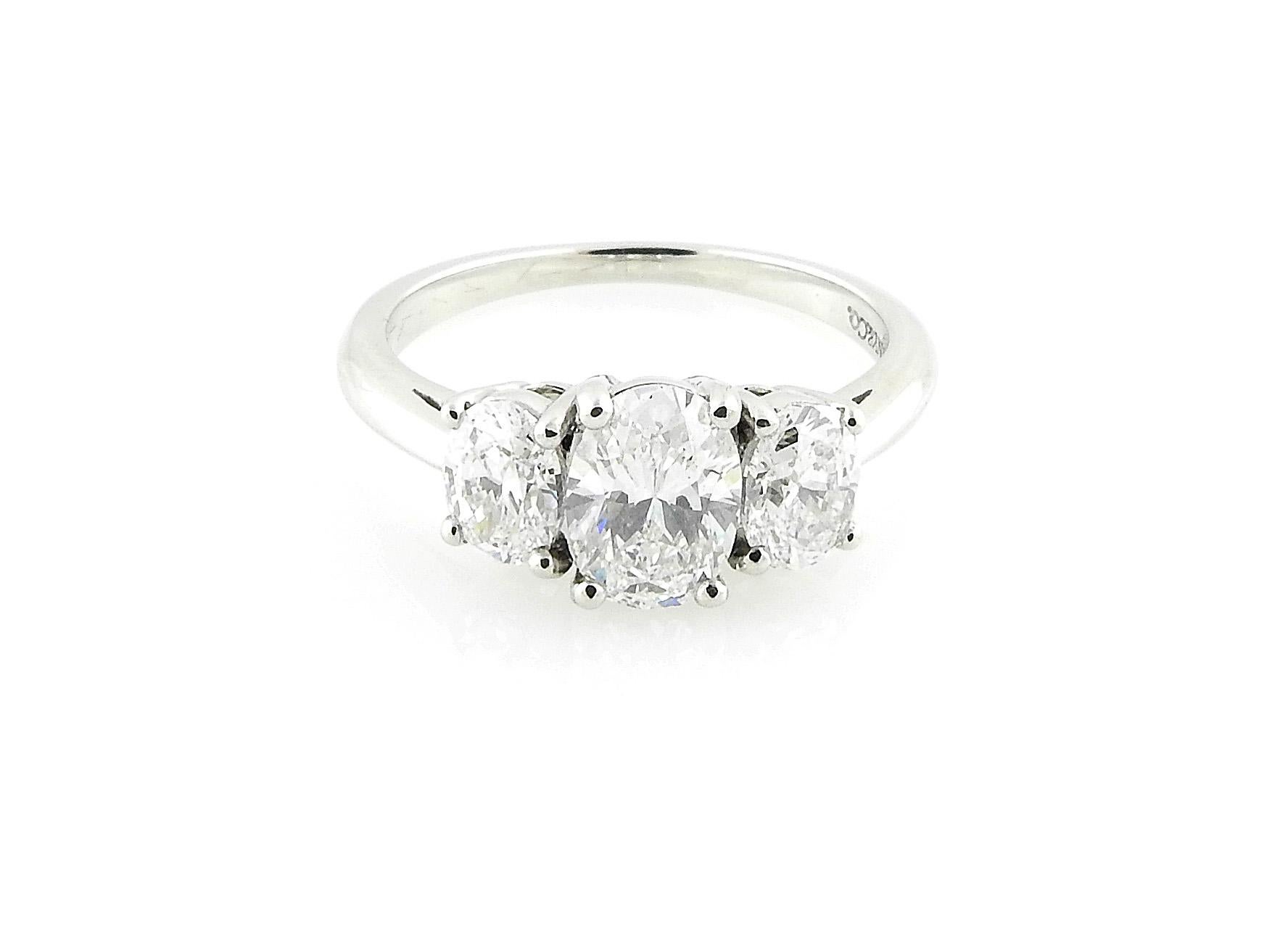 Tiffany & Co. Platinum Engagement Ring

Everything you will need to present the perfect Tiffany & Co. engagement ring is included with this gorgeous ring!

This stunning Tiffany & Co. engagement ring is set in platinum. 3 oval diamonds are each set