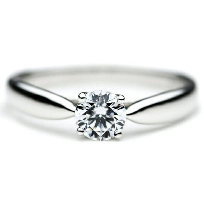 TIFFANY & Co. Harmony Platinum .36ct Diamond Engagement Ring 6

Metal: Platinum
Size: 6
Weight: 4.20 grams
Diamond: round brilliant diamond, carat total weight .36, I color, VS1 clarity
Hallmark: ©TIFFANY&Co. Pt950 70342480 D0.36ct