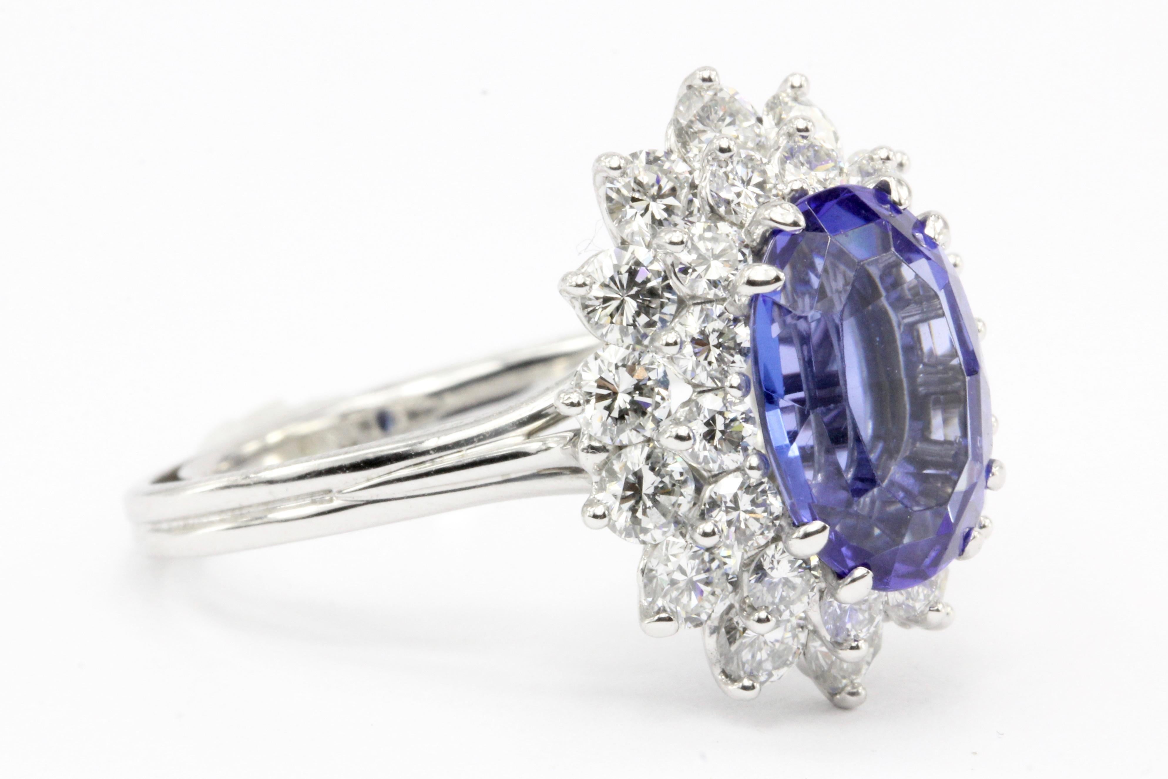 Era: Modern

Hallmarks: T&Co

Composition: Platinum

Primary Stone: Tanzanite

Stone Carat: 3.96 Carats

Hue: Violetish Blue

Tone: Medium Light

Saturation: Strong

Dimensions: 11.97 x 8.12 x 5.12mm

Shape: Oval Faceted

Accent Stone: 28 Round
