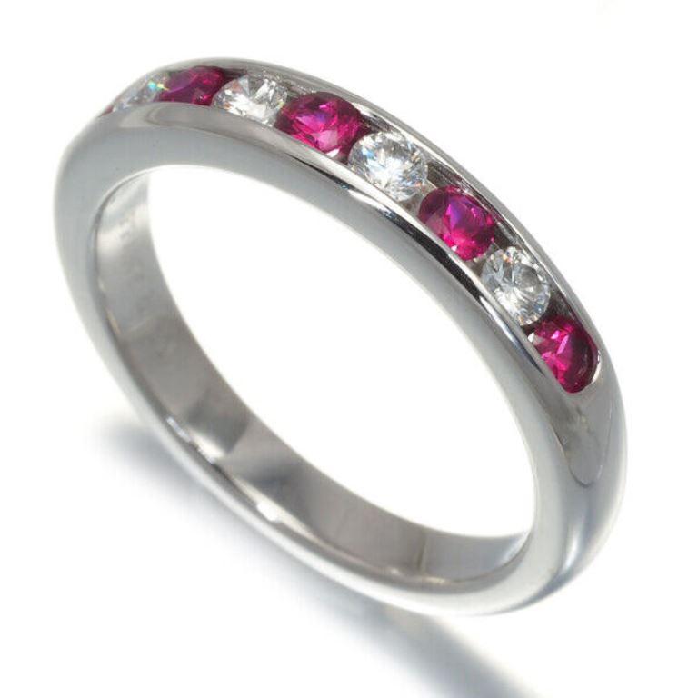 TIFFANY & Co. Platinum 3mm Half Circle Diamond Ruby Band Ring 4

Metal: Platinum 
Size: 4
Band Width: 3mm 
Diamond: 4 round brilliant diamonds, total carat weight .18 
Ruby: 5 round rubies, total carat weight .20  
Hallmark: TIFFANY&Co. PT950