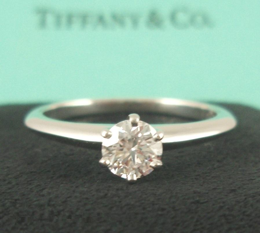 TIFFANY & Co. Platinum .40ct Diamond Engagement Ring 4.5

Metal: Platinum
Size: 4.5
Diamond: Round brilliant diamond, carat total weight .40ct, G Color, VVS1 Clarity
Hallmark: ©TIFFANY&Co. PT950  60915458  D0.40CT
Condition: Excellent condition,