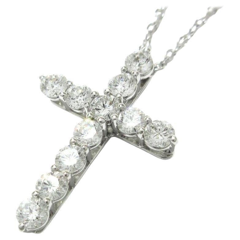 TIFFANY & Co. Collier croix en platine avec diamant de 0,42ct en vente