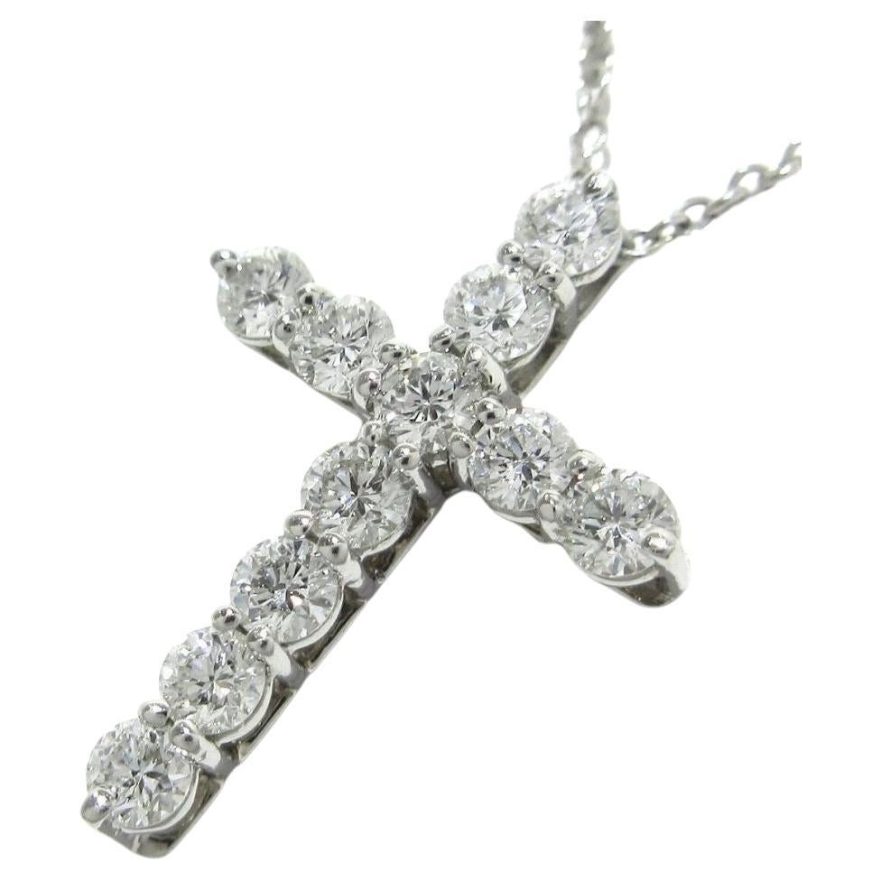 TIFFANY & Co. Collier croix en platine avec diamant de 0,42ct 