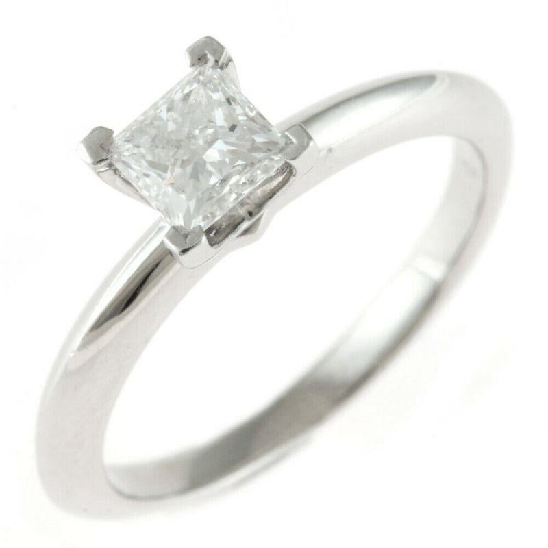 TIFFANY & Co. Platinum .43ct Princess Cut Diamond Engagement Ring 5

Metal: Platinum
Size: 5
Diamond: princess cut diamond, carat total weight .43ct, Color E, Clarity VVS1
Hallmark: ©TIFFANY&Co. PT950   23006642  .43CT
Condition: Excellent