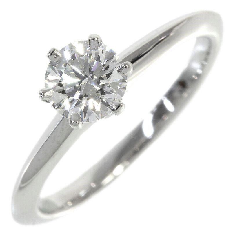 TIFFANY & Co. Platinum .48ct Diamond Engagement Ring 5.5

Metal: Platinum
Size: 5.5
Diamond: carat total weight .48ct, I color, VVS2 clarity
Hallmark: ©TIFFANY&Co. PT950  62410698  D0.48CT
Condition: Excellent condition, like new, comes with Tiffany