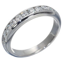 TIFFANY 
Co. Anello in platino con diamanti lucidi a mezzo cerchio da 4 mm 5