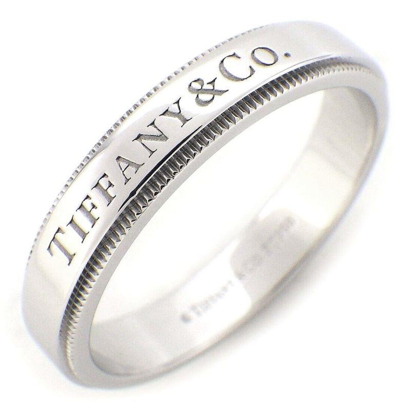 TIFFANY & Co. Platinum 4mm Milgrain Wedding Band Ring 9

Metal: Platinum 
Size: 9
Band Width: 4mm
Weight: 8.10 grams 
Hallmark: 