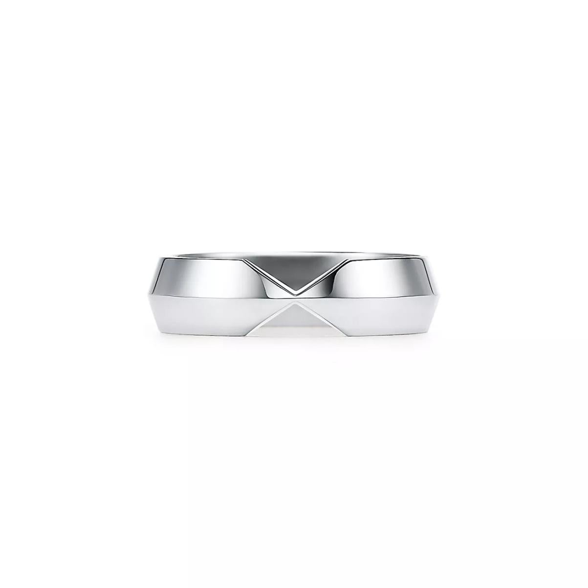 TIFFANY & Co. Platinum 5.3mm Nesting Wide Band Ring 8.5

Metal: Platinum
Size: 8.5
Band Width: 5.3mm
Weight: 8.30 grams
Hallmark: ©TIFFANY&Co. Pt950
Condition: Excellent condition, like new, comes with Tiffany pouch and box
Tiffany price: