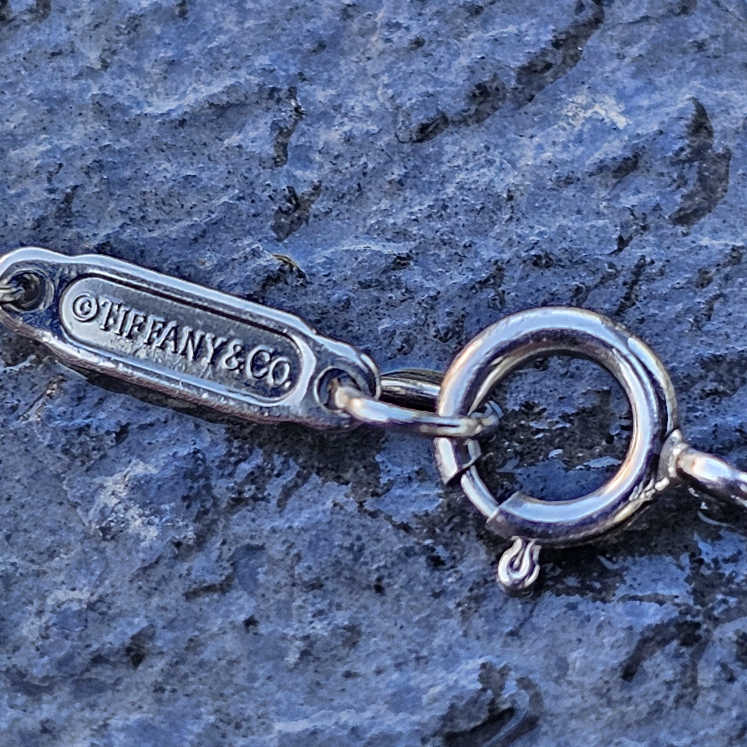 Tiffany & Co. Collier en platine avec pendentif en forme de cœur ouvert et diamant de 0,64ct 4,5g 17
