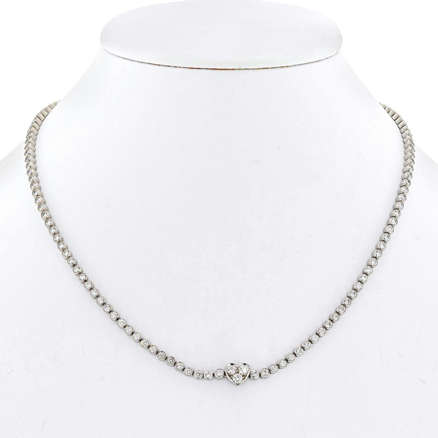 A series of bezel-set diamonds define this elegant tennis necklace, Tiffany & Co. 
The lock is beautifully crafted in a shape of a heart and can be worn in the front as well is in the back of the neck. 
Diamonds are of an exceptional quality just