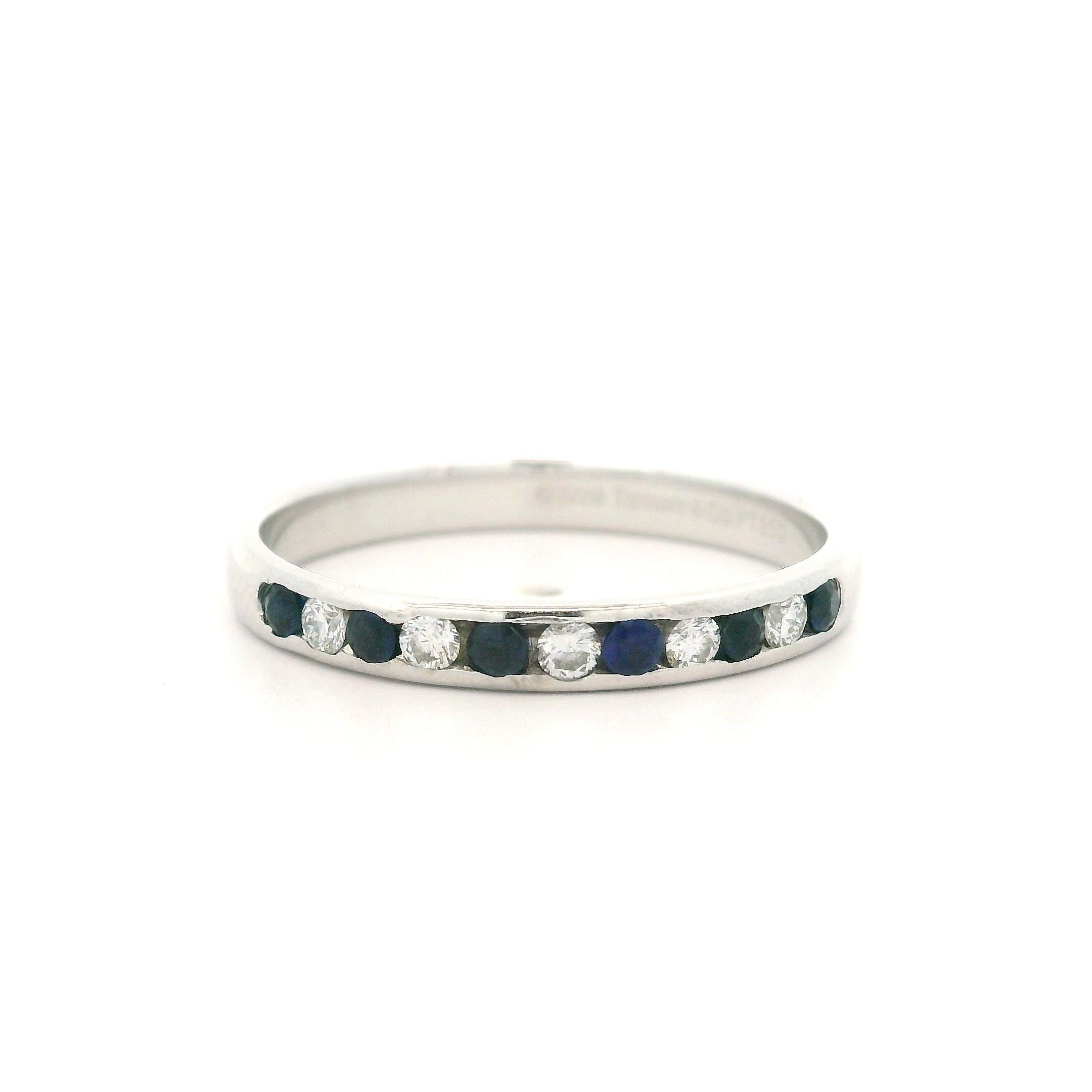 --Stone(s):--
(6) Natural Genuine Sapphire - Round Brilliant Cut - Channel Set - Royal Blue Color 
(5) Natural Genuine Diamonds - Round Brilliant Cut - Channel Set - White Color 

Material: Solid Platinum .900+
Weight: 3.90 Grams
Ring Size: 9.5