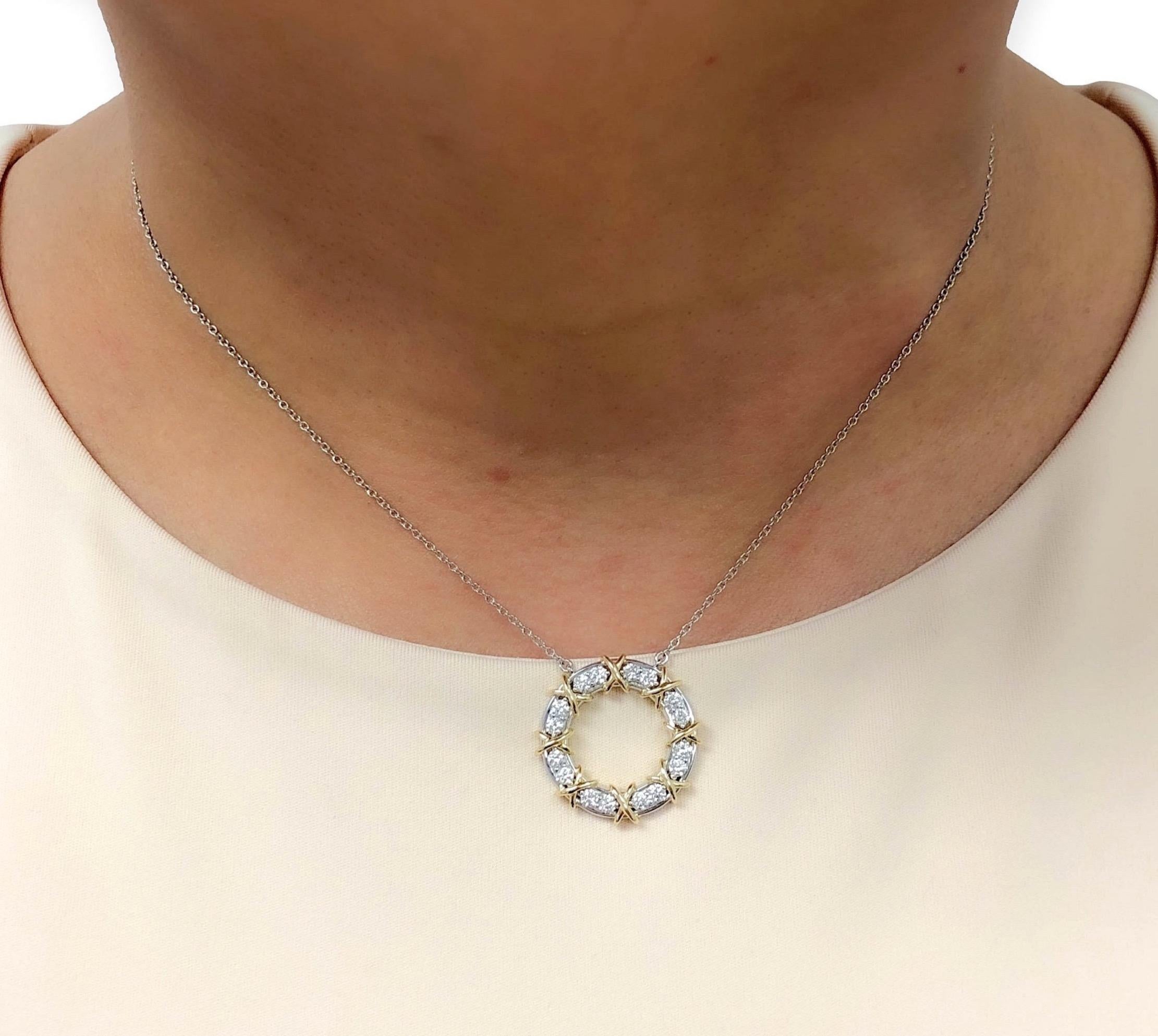 Brilliant Cut Tiffany & Co. Platinum and 18k Gold Schlumberger 16 Stone Pendant Necklace