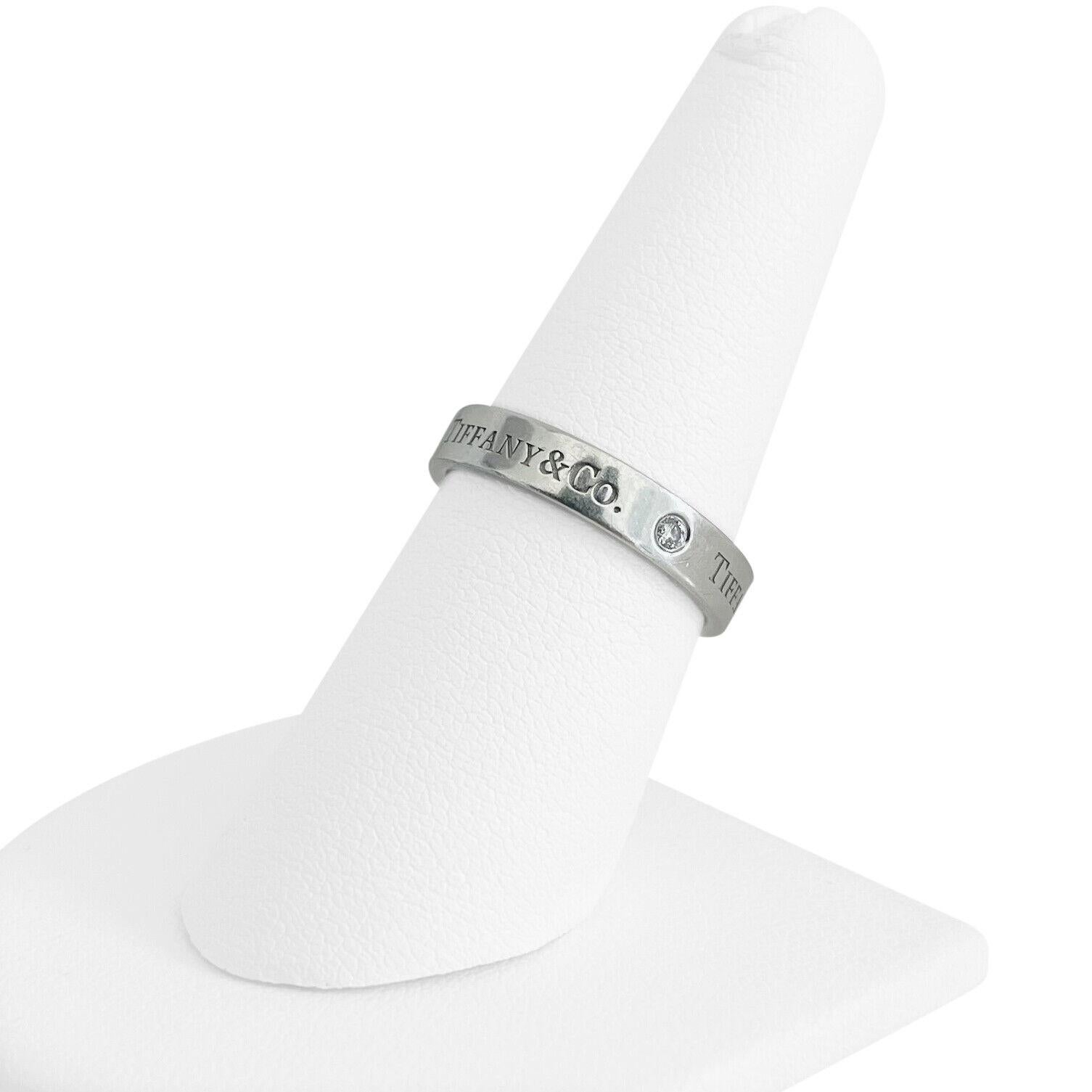 Tiffany & Co. Platinum and Diamond 4mm Band Ring Size 5.75

Condition:  Excellent Condition, Professionally Cleaned and Polished
Metal:  Platinum 950 (Marked, and Professionally Tested)
Weight:  7.5g
Diamonds:  Three Round Brilliant Diamonds