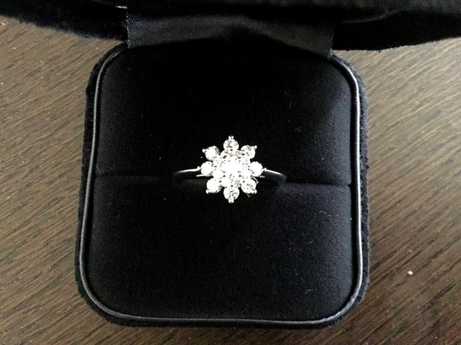 Tiffany & Co. Platinum and Diamond Flower Ring .60 Carat For Sale 4