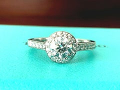 Tiffany & Co. Platinum and Diamond Halo Round Engagement Ring .51 Carat G VVS2