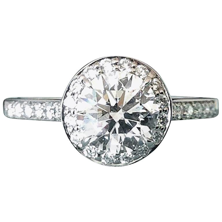 Tiffany and Co. Platinum and Diamond Halo Round Engagement Ring .51 Carat G VVS2 at 1stDibs