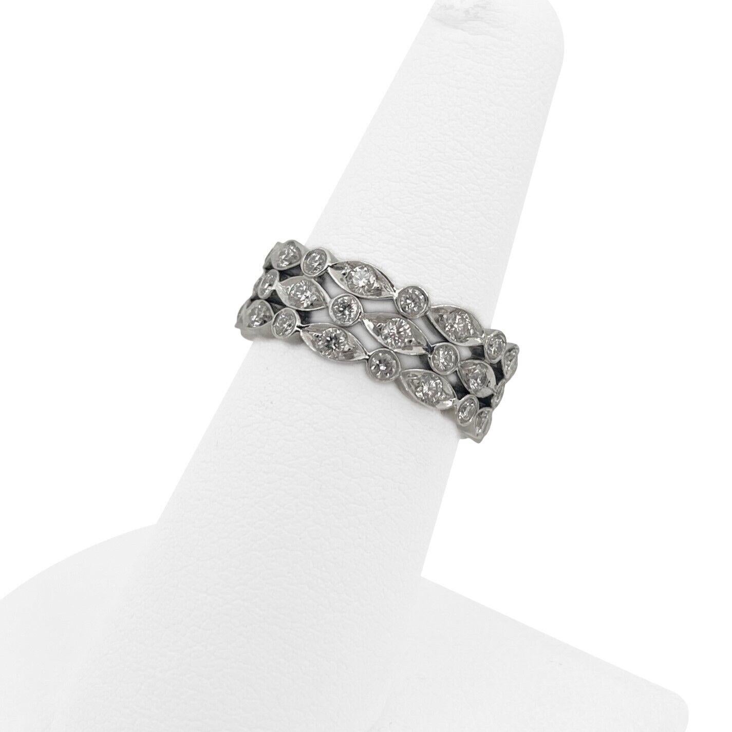 Tiffany & Co. Platinum and 1.6ctw Diamond Jazz Band Ring Size 6.25

Condition:  Excellent Condition, Professionally Cleaned and Polished
Metal:  Platinum 950 (Marked, and Professionally Tested)
Weight:  8.1g
Diamonds:  48 Round Brilliant Diamonds