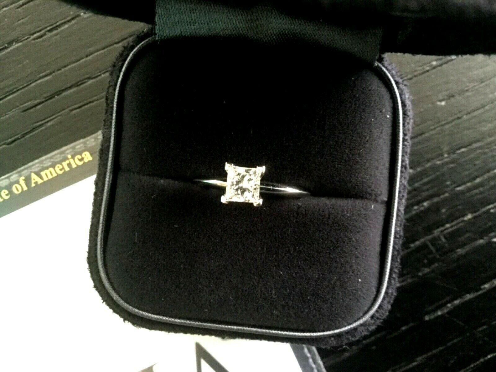 Tiffany & Co. Platinum and Diamond Princess Cut Ring .57 Carat D VS2 8