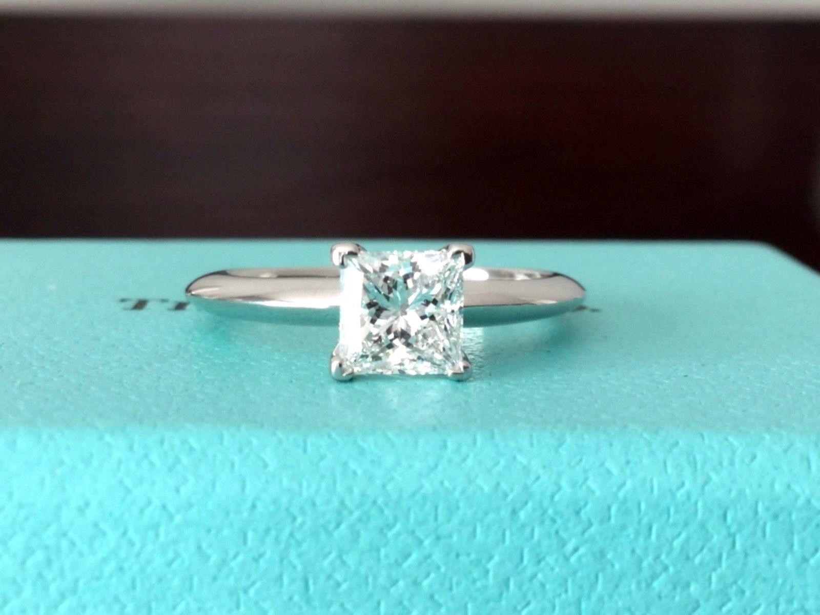 For your consideration is a Tiffany & Co Princess cut, natural diamond solitaire that is .79 carats, F in Color and VS1 in Clarity and EXCELLENT cut and polish and very good symmetry making it a very rare and desirable diamond.  It is set in the