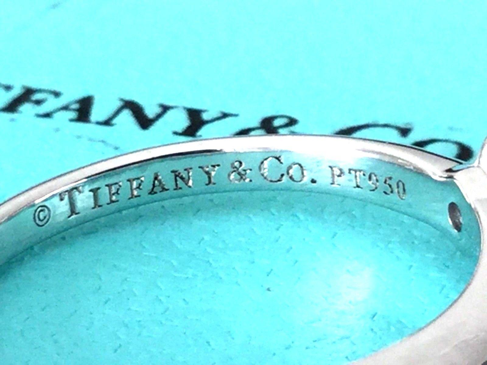 Tiffany & Co. Platinum and Diamond Princess Cut Ring .79 Carat F VS1 4