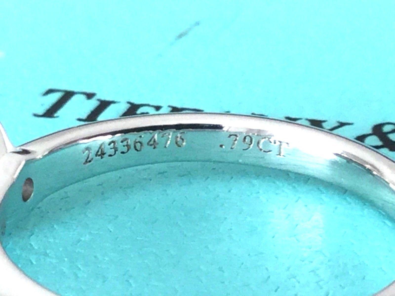 Tiffany & Co. Platinum and Diamond Princess Cut Ring .79 Carat F VS1 4