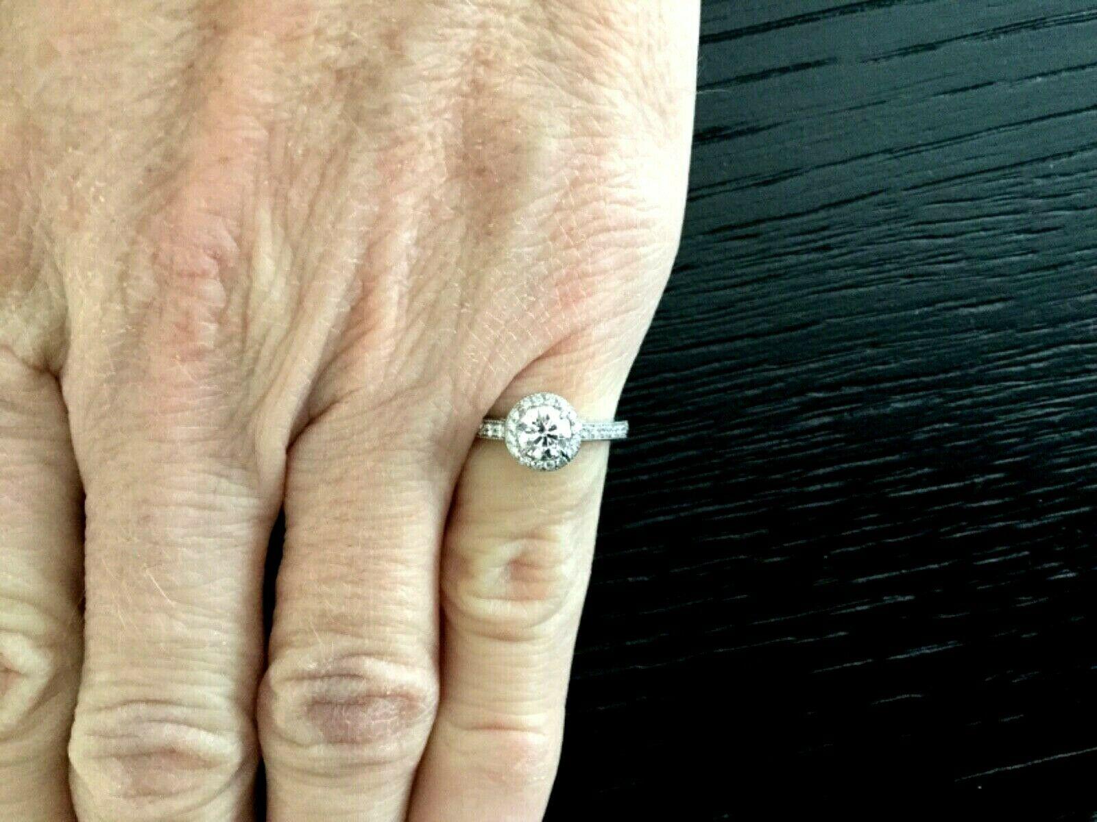 Tiffany & Co. Platinum and Diamond Round Engagement Ring E VS1 Triple Excellent In Excellent Condition For Sale In Middletown, DE