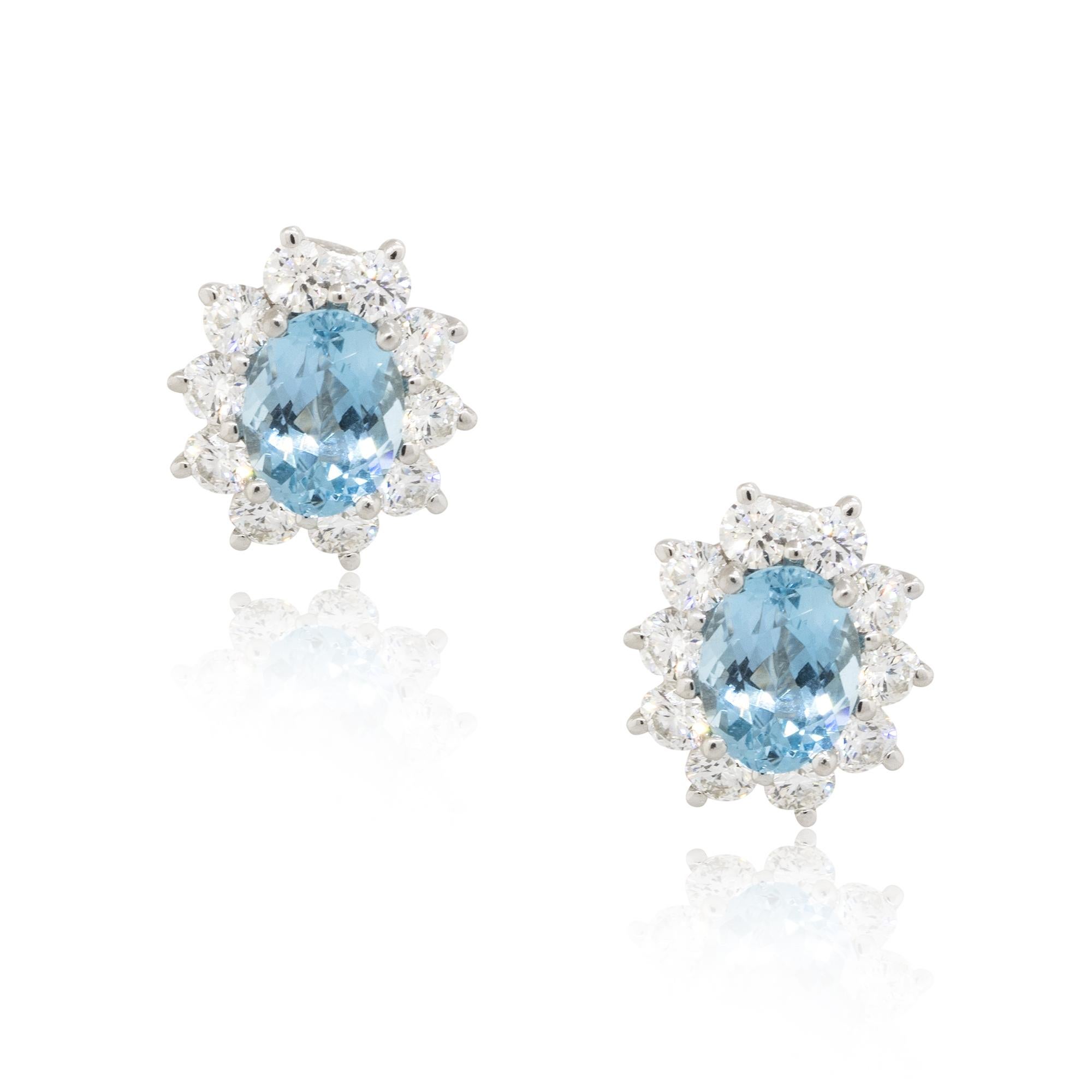 Brand: Tiffany & Co.
Material: Platinum
Diamond Details: Approx. 2.21ctw of round cut Diamonds. Diamonds are F/G in color and VVS-VS in clarity
Gemstone Details: Oval cut Aquamarine gemstones
Earring Measurements: 11.60mm x 13mm x 16.45mm
Total