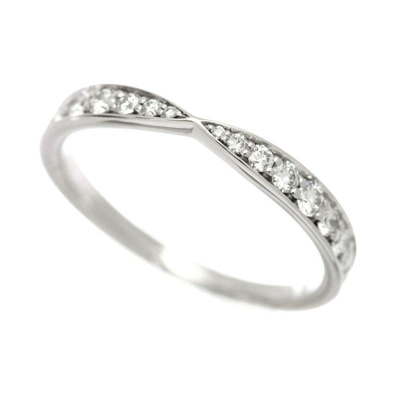 TIFFANY & Co. Harmony Platinum Diamond 1.8mm Band Ring 6

A beautiful study in balance, this gently tapered diamond band is perfectly proportioned to complement its matching engagement ring. Together they make a beautiful bridal duet.

 Metal: