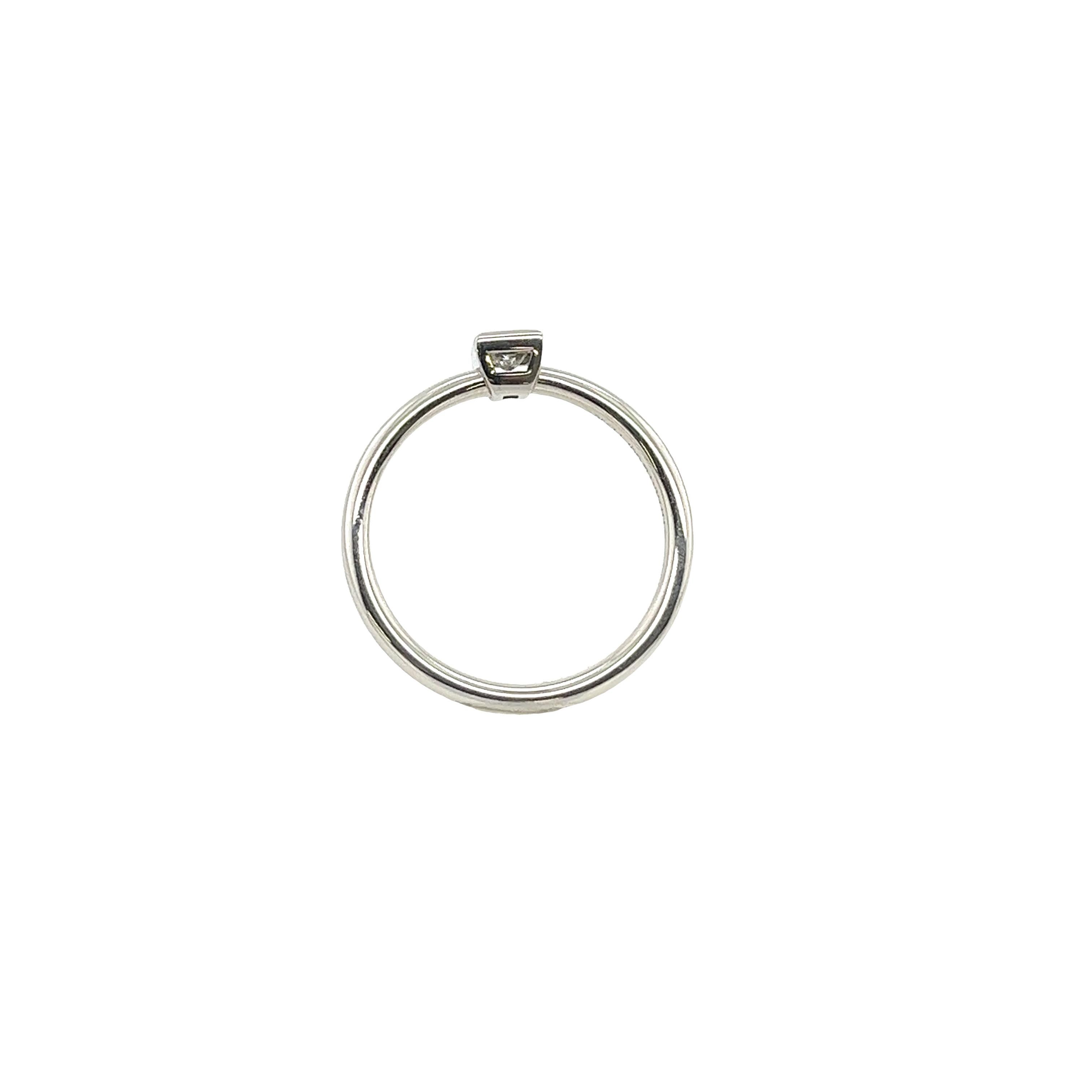 Women's Tiffany & Co. Platinum Bezel Set Diamond ring set with 0.13ct Princess cut Diam For Sale