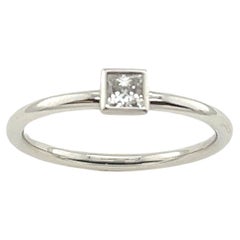 Tiffany & Co. Platinum Bezel Set Diamond ring set with 0.13ct Princess cut Diam