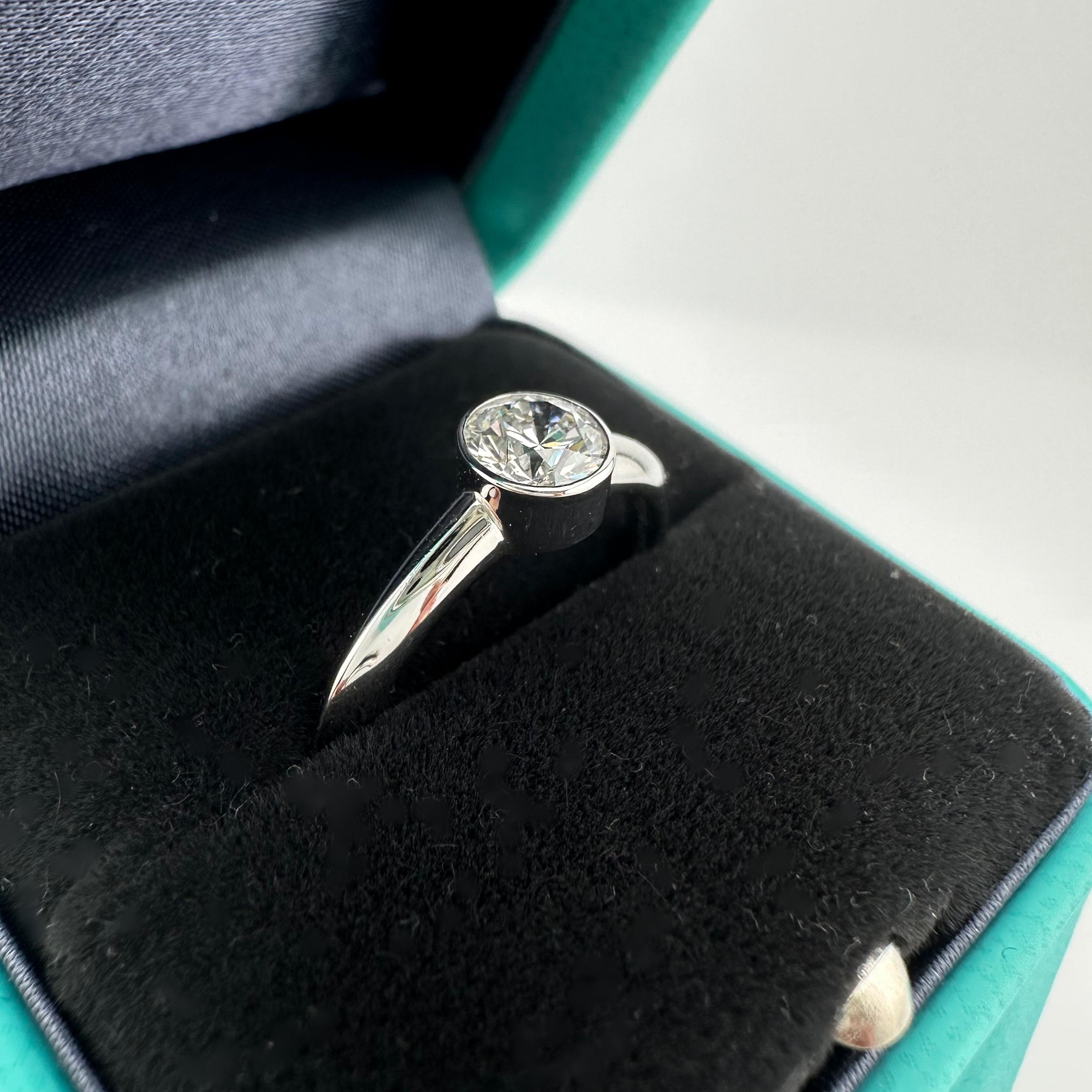 Tiffany & Co Platinum Bezet Diamond Engagement Ring Round 0.57ct F VS1 Bezel Set For Sale 7
