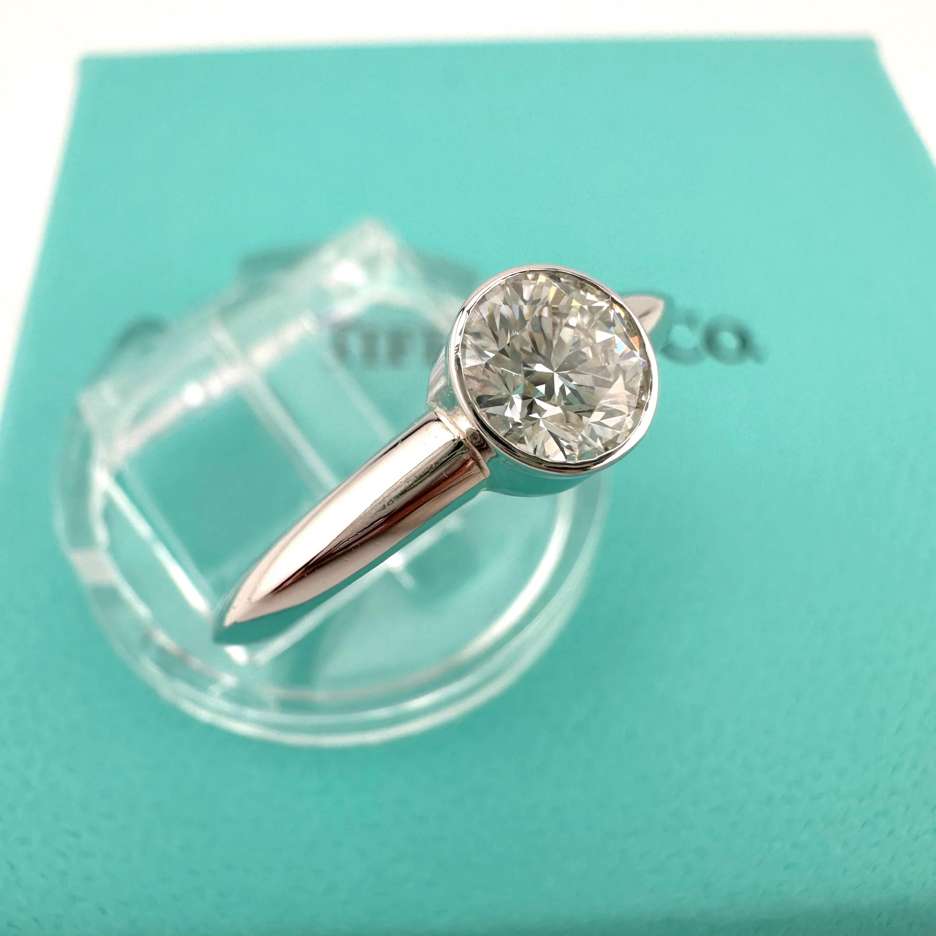 Round Cut Tiffany & Co Platinum Bezet Diamond Engagement Ring Round 0.57ct F VS1 Bezel Set For Sale