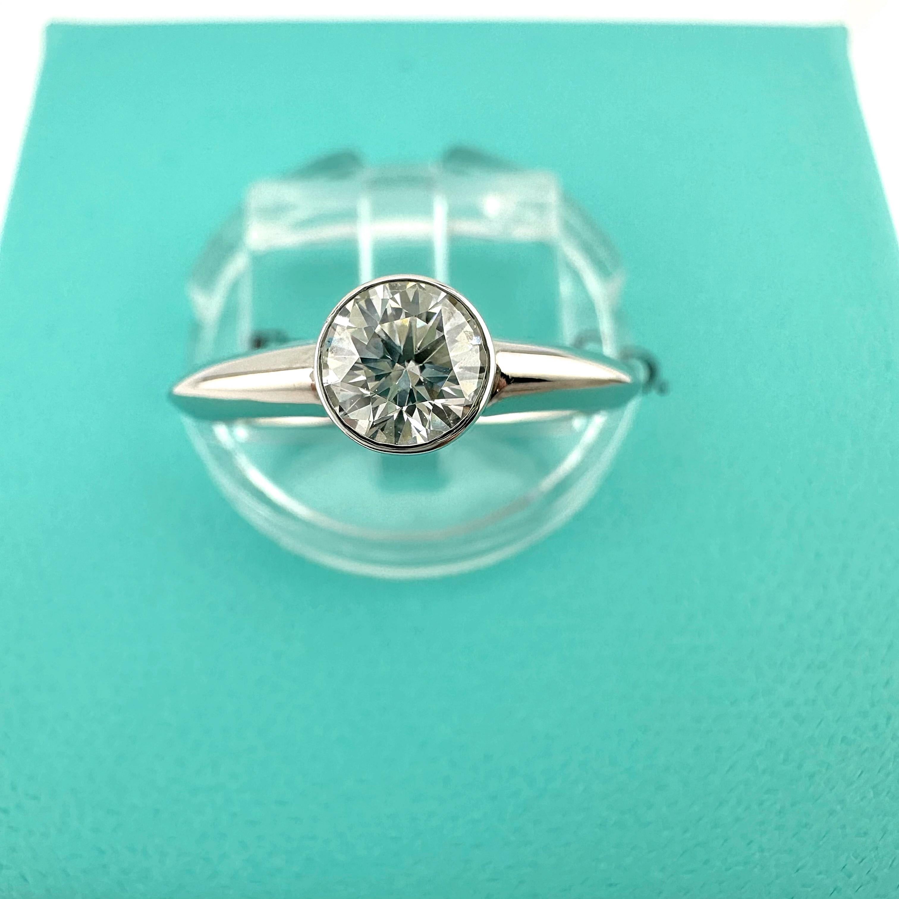 Tiffany & Co Platinum Bezet Diamond Engagement Ring Round 0.57ct F VS1 Bezel Set In Excellent Condition For Sale In San Diego, CA