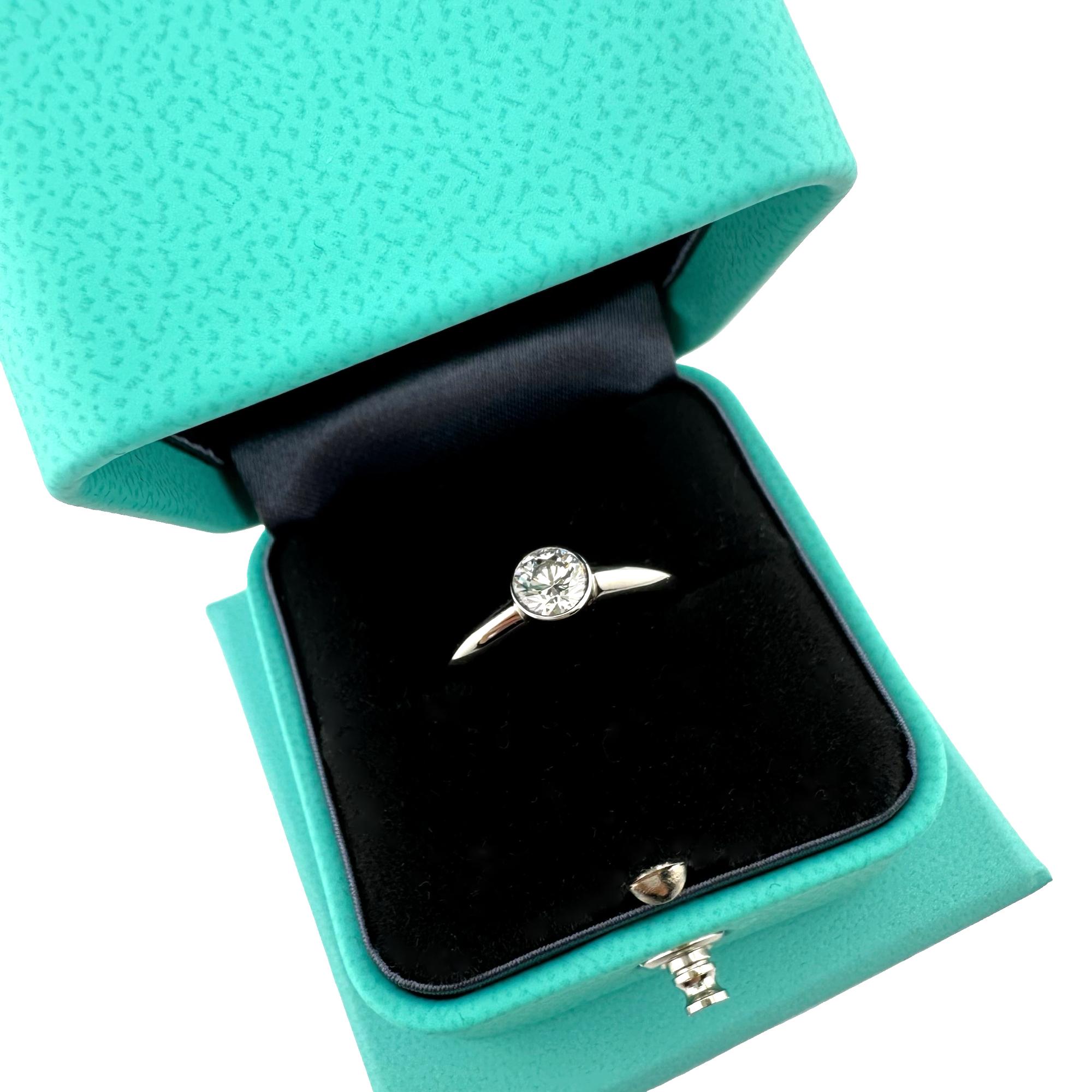 Tiffany & Co Platinum Bezet Diamond Engagement Ring Round 0.57ct F VS1 Bezel Set For Sale 4