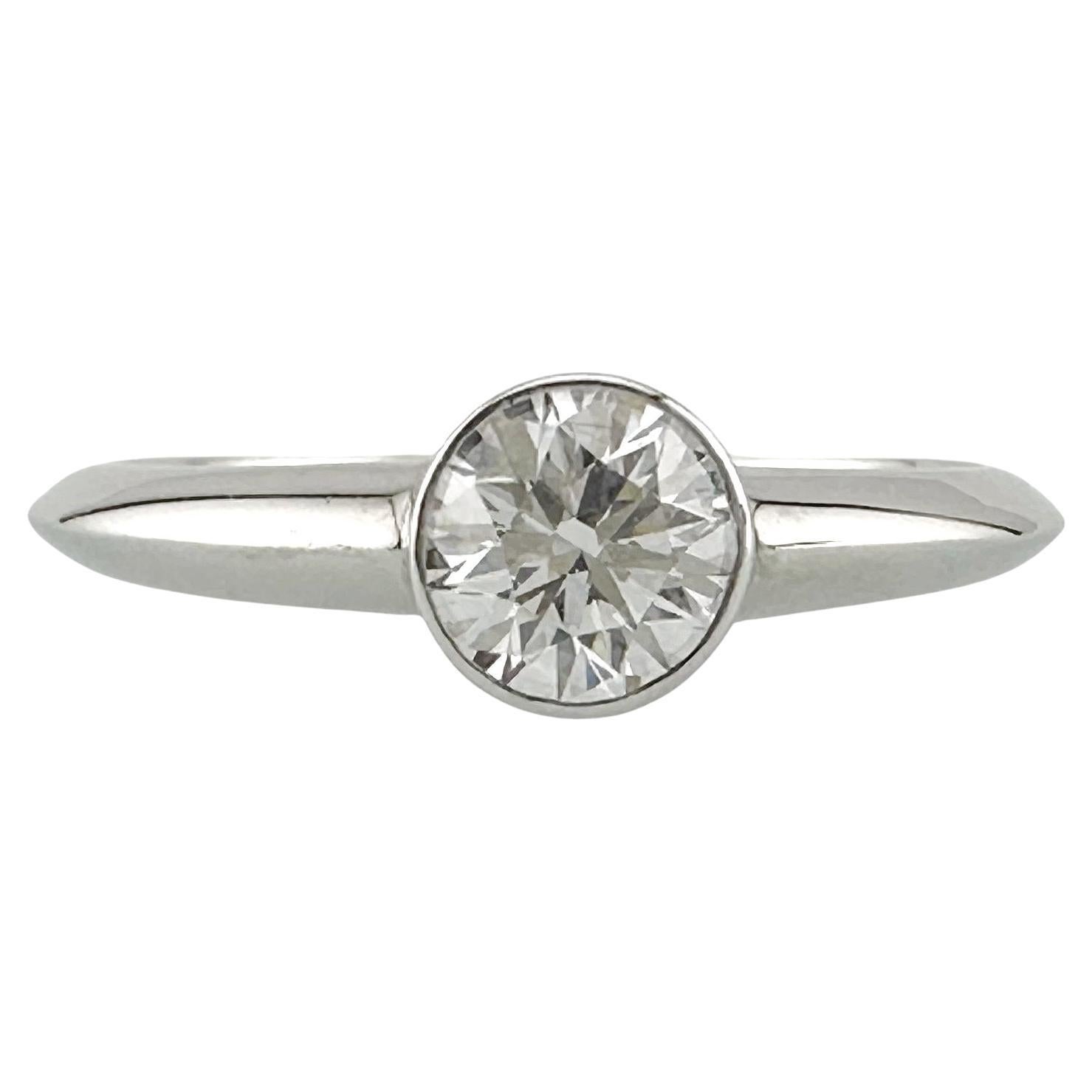 Tiffany & Co Platinum Bezet Diamond Engagement Ring Round 0.57ct F VS1 Bezel Set For Sale