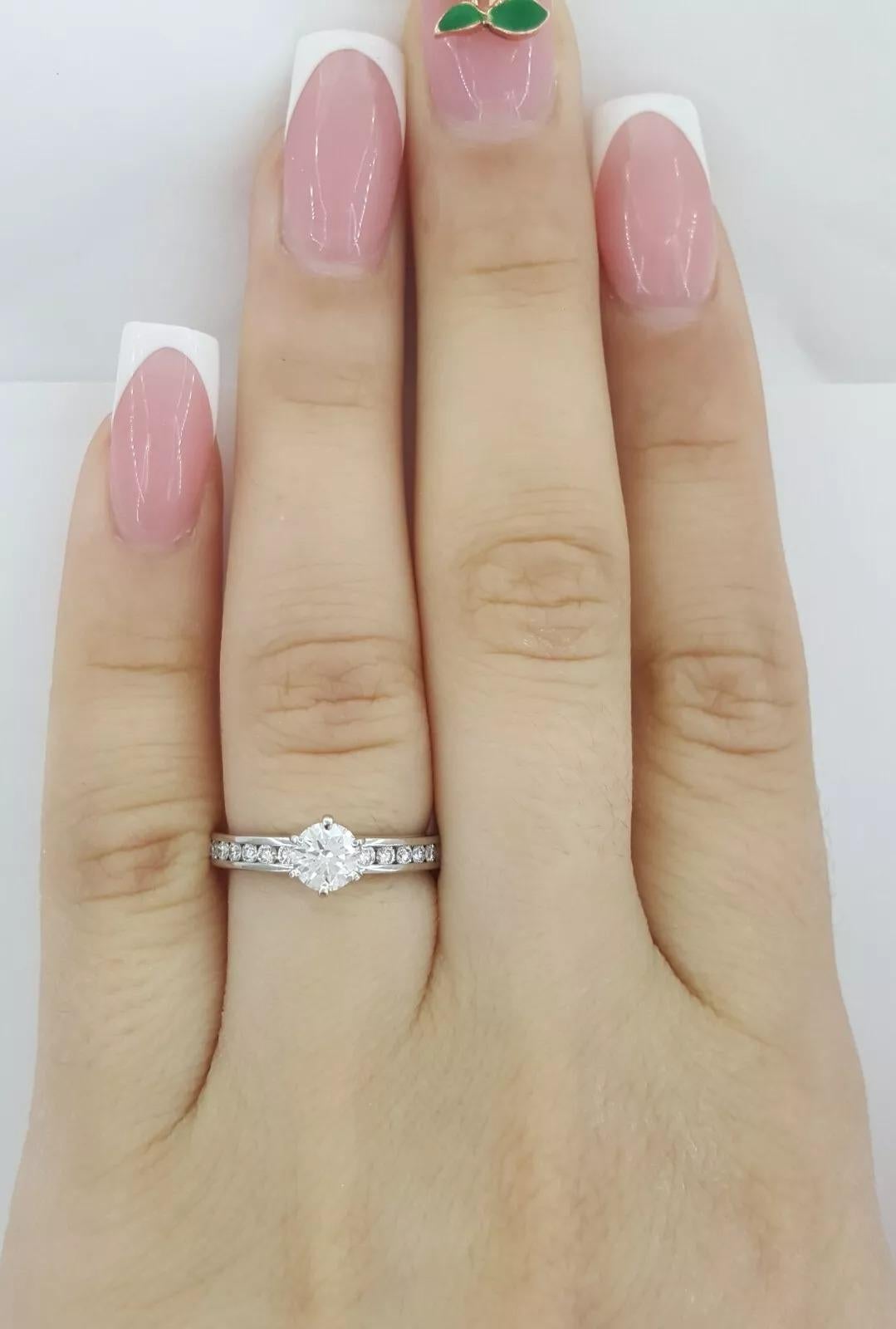 Round Cut Tiffany & Co. Platinum Channel-Set Diamond Engagement Ring For Sale